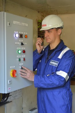 A Rotork engineer confirms the successful operation of the new control panel during site commissioning.
