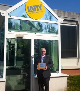 Robert Jones, Area & Business Development Manager of Latty International Ltd with the BVAA plaque.